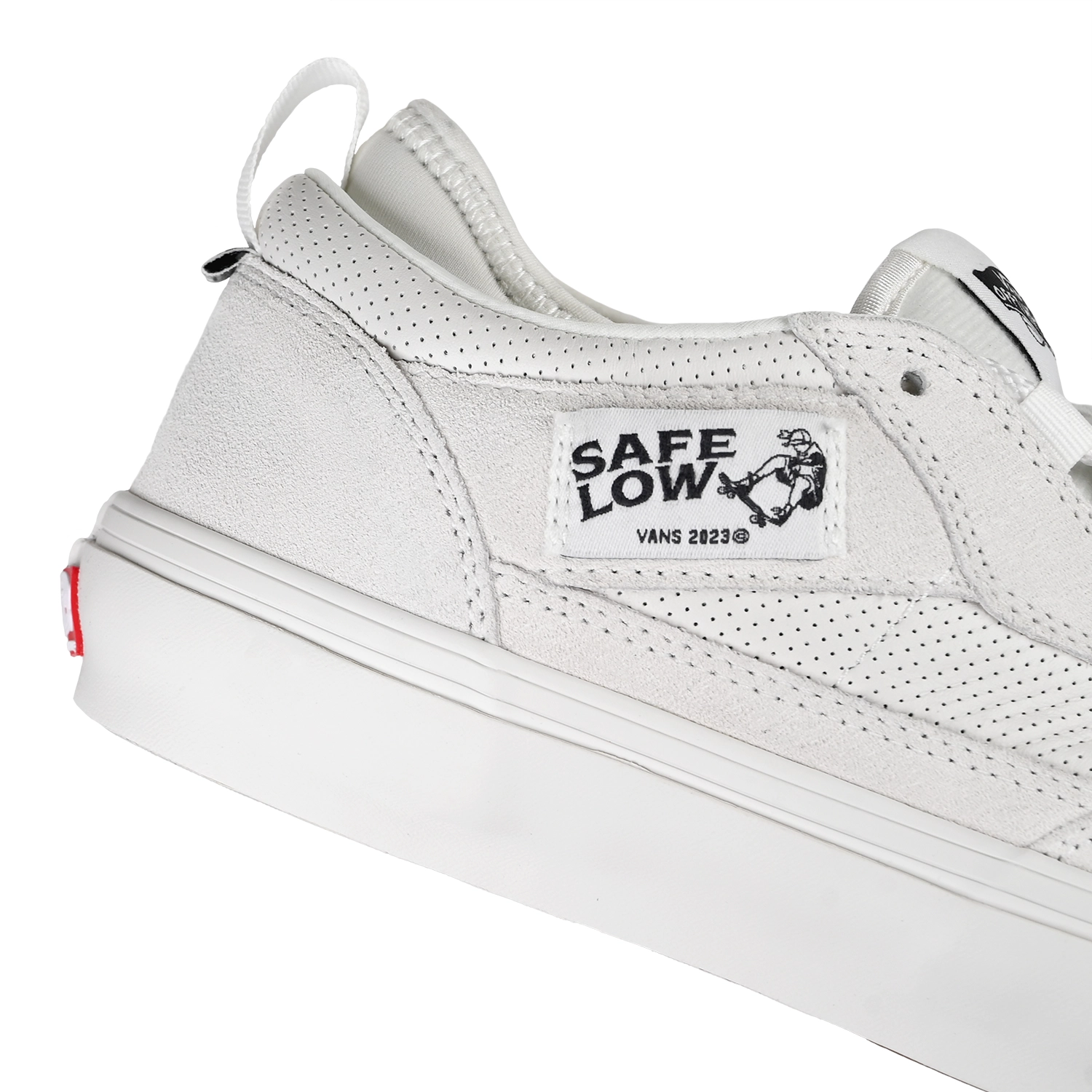 Close up of white Vans Skateboarding Skate Safe Low Men's skateboard sneakers on white background