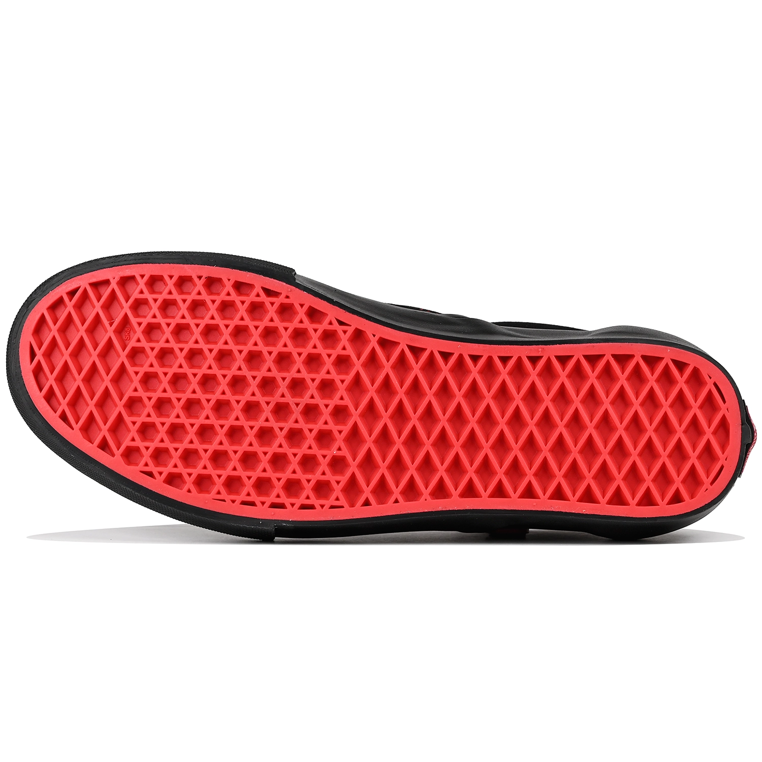 Red outsole of Vans Skateboarding Skate Slip-On sneaker on white background