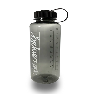 1000 milliliter (34 ounce) BPA free water bottle with No-Comply Script Box font printed on front with screw top, available exclusively at No-Comply Skate Shop in Austin, TX
